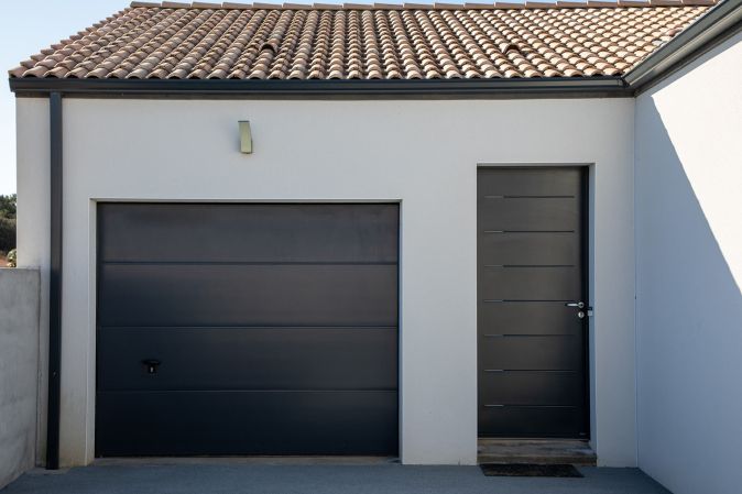 Porte de garage en lames aluminium pour une meilleure isolation